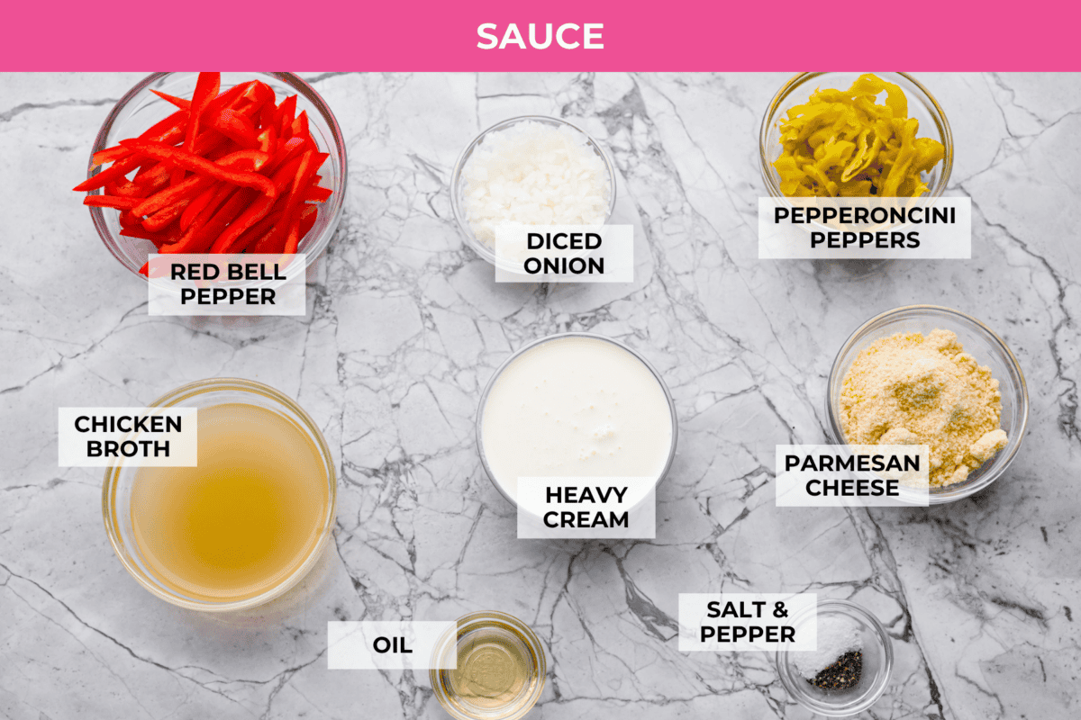 Creamy pepperoncini chicken is an easy one-skillet dinner packed with flavor! Tender chicken is smothered in a rich Parmesan cream sauce with bell peppers and tangy pepperoncini. It's the perfect balance of creamy, savory, and zesty flavor. Overhead shot of labeled sauce ingredients.