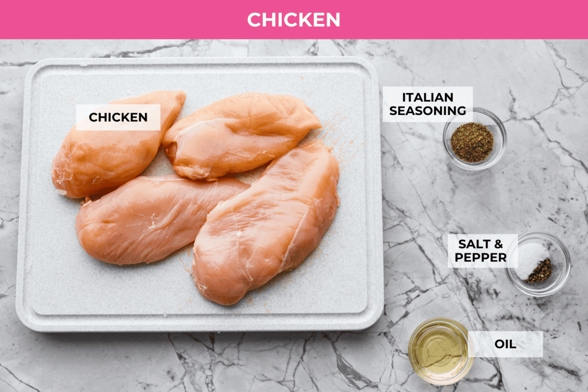 Creamy pepperoncini chicken is an easy one-skillet dinner packed with flavor! Tender chicken is smothered in a rich Parmesan cream sauce with bell peppers and tangy pepperoncini. It's the perfect balance of creamy, savory, and zesty flavor. Overhead shot of labeled ingredients.