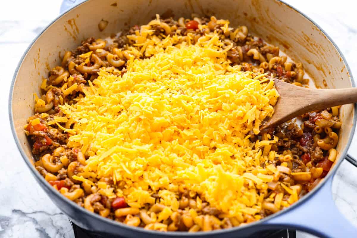 Cheese added to the cooked down beef and noodle mixture. 