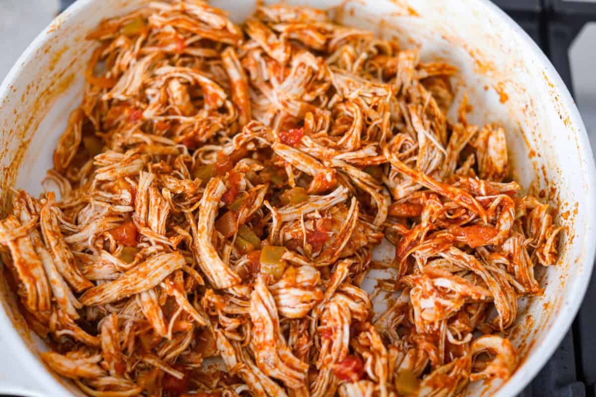 Shredded chicken tacos turn cooked chicken into juicy, flavorful tacos with salsa, lime, and a few simple seasonings. Use rotisserie chicken or choose from four easy ways to cook and shred your own. Everything mixed together in the skillet.