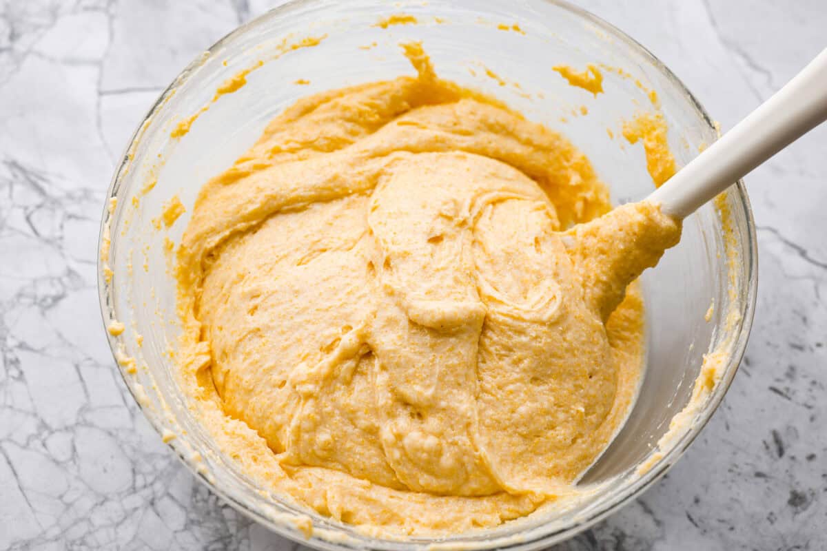 This cornbread loaf is soft, buttery, and just sweet enough, with crisp golden edges and a tender crumb. Baking it in a loaf pan gives classic cornbread a fun twist that’s easy to slice and serve with chili, stew, or your favorite comfort food. Wet and dry ingredients mixed together.