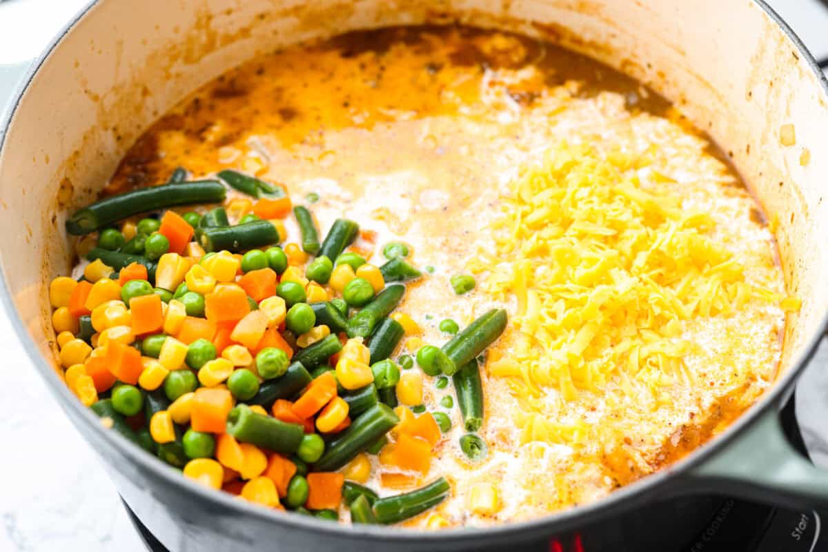 Shepherd’s pie soup has all the cozy, comforting flavors of classic shepherd’s pie in one hearty bowl! Think savory beef, tender potatoes, vegetables, and melted cheddar in a rich, creamy broth. It’s classic comfort food with a fun twist! Cream, veggies, and cheese added to the pot.