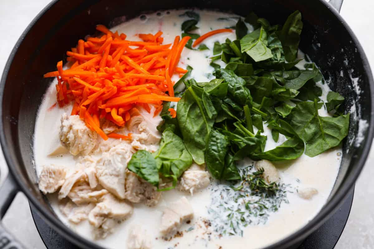 My creamy chicken gnocchi soup has everything I love about the Olive Garden favorite: tender chicken, pillowy gnocchi, fresh vegetables, and a rich, creamy broth. Even better, it comes together in just 30 minutes! Veggies, chicken, and gnocchi added to the pot.