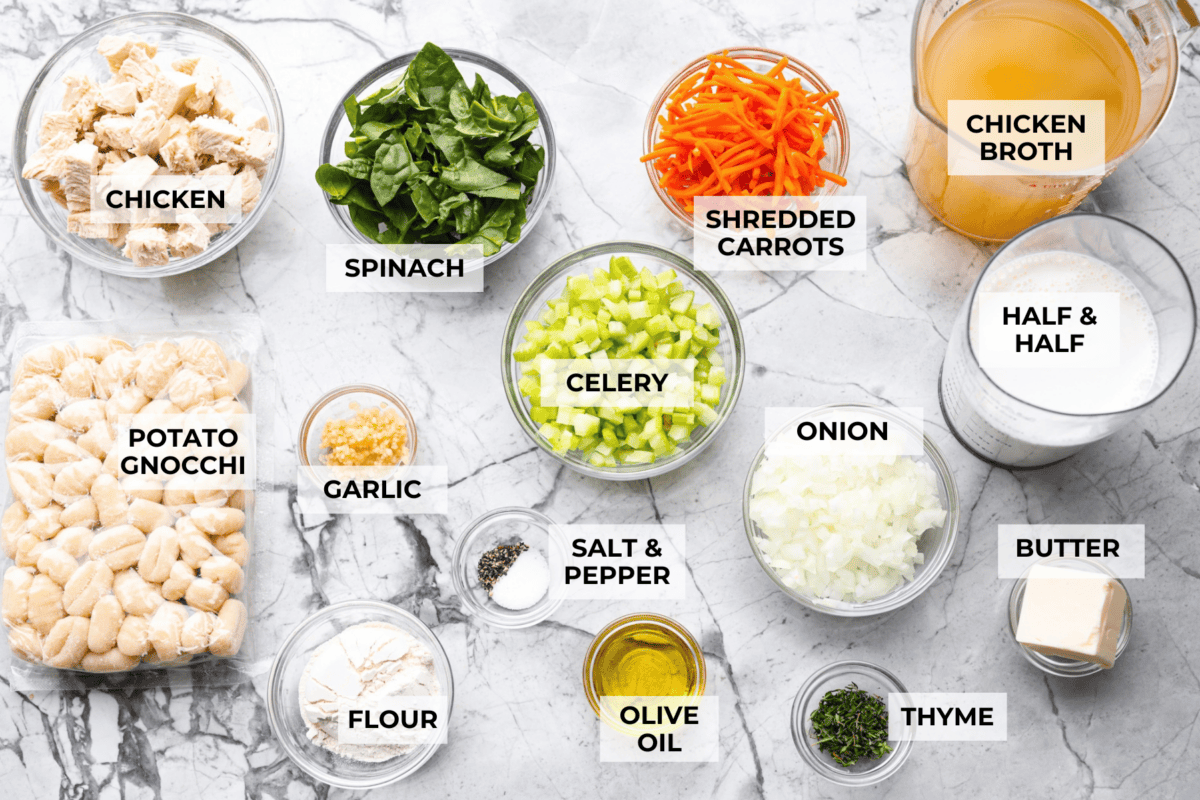 My creamy chicken gnocchi soup has everything I love about the Olive Garden favorite: tender chicken, pillowy gnocchi, fresh vegetables, and a rich, creamy broth. Even better, it comes together in just 30 minutes! Overhead shot of labeled chicken gnocchi soup ingredients.