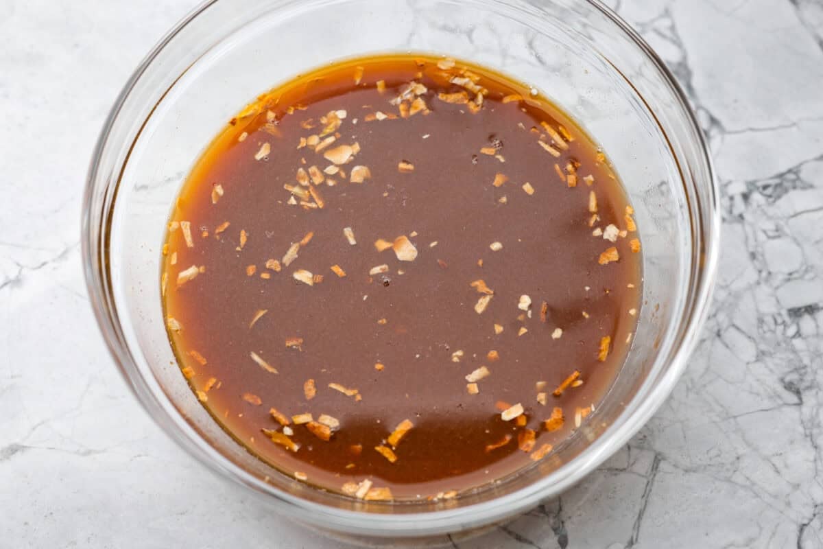 Sauce ingredients aded to a mixing bowl. 