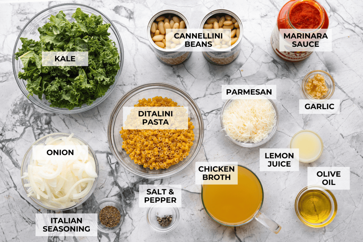 Overhead shot of labeled Stanley Tucci pasta fagioli ingredients. 